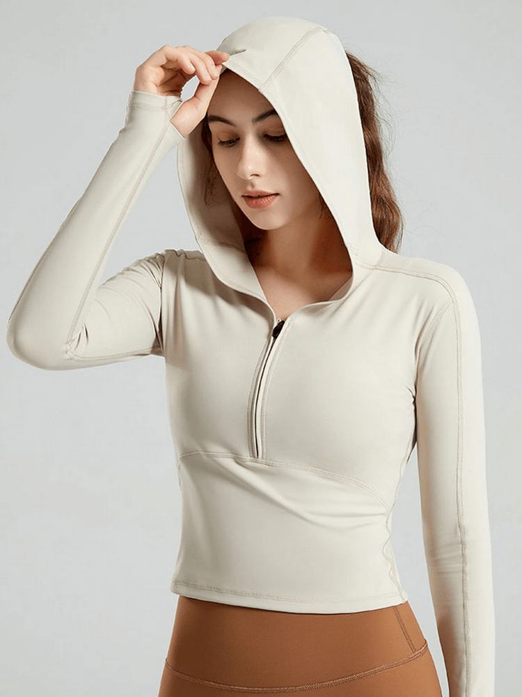 Stylish women's sports top with long sleeves and hood for yoga, made of breathable nylon and spandex, SF1430.